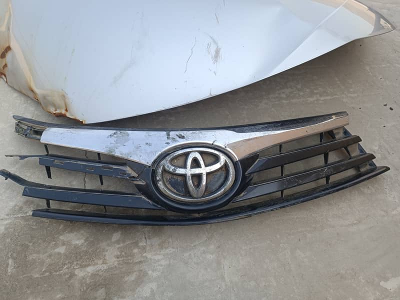 Toyota grill with Monogram, chrome & mud cover corolla GLI 2018 1