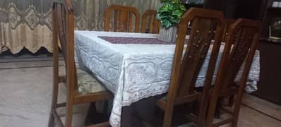 Solid wooden dining table with 6 chairs