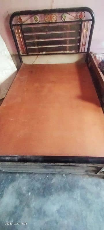 single iron bed with mattress. 3