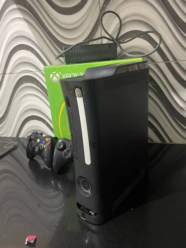 Xbox 360 with 2 wireless controllers n box 1