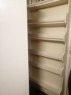 Vertical freezer. . . 4 shelves . . . . . USED for a very short period