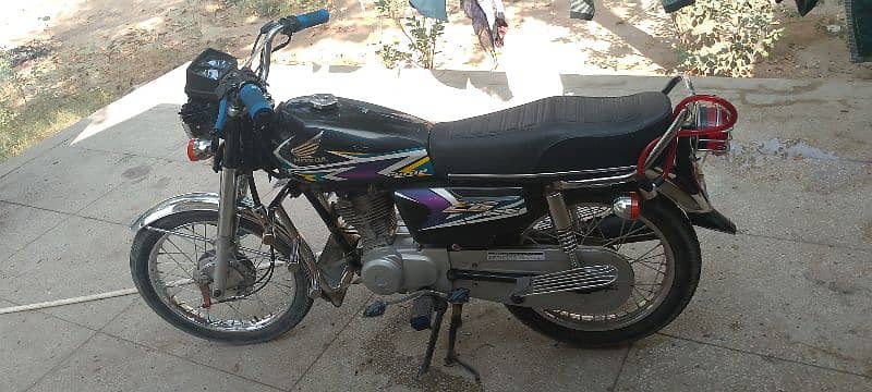 Honda 125 like new bike 4