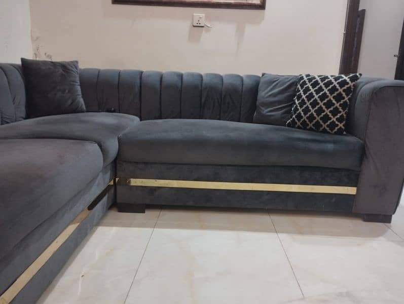 Gray L shaped sofa with cushions (8 seater) 1