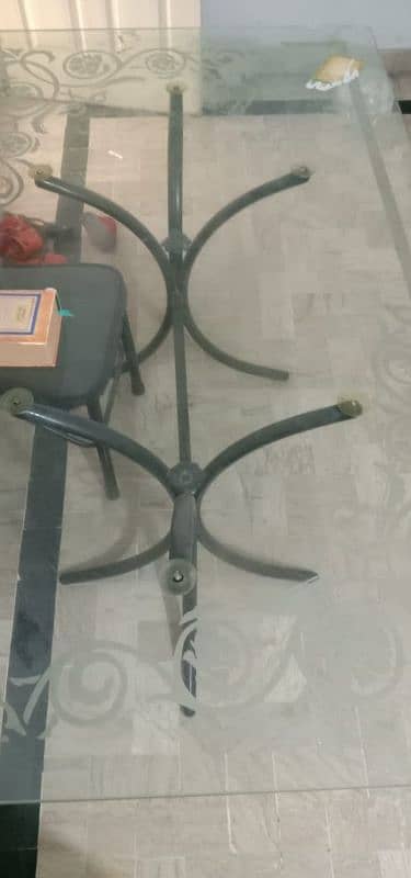 8 seater dinning table with 6 iron chairs. 5