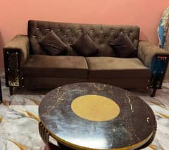 Sofa set and center table for sale in reasonable price.