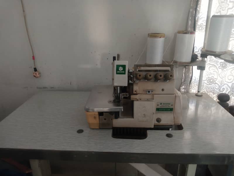 Overlock Machine by Zoje Sewing Machine with Sarbo Motor 1