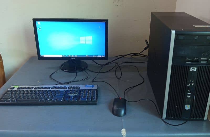 hp workstation desktop including keyboard, mouse and monitor as well 0