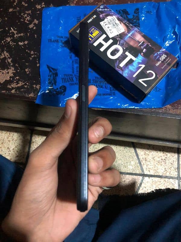 Infinix hot 12 condition 10by9  ram 6+6 128 box or charger sat ha 2