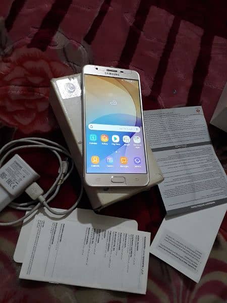 03165859104 Samsung J7 prim,Complet box,finger print,Ram 3gb,memry16gb 17