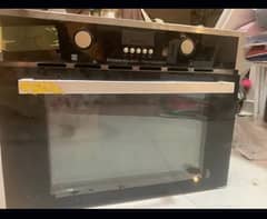 Microwave cooking range