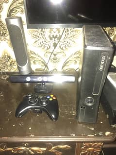 xbox 360 slim 200 gb with 19 games and a camera