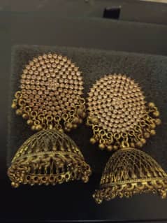 Elegant Vintage Gold-Toned Jhumka Earrings with Intricate Detailing