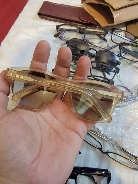 rayben,fossil,d&g eye glasses and sunglasses. 12