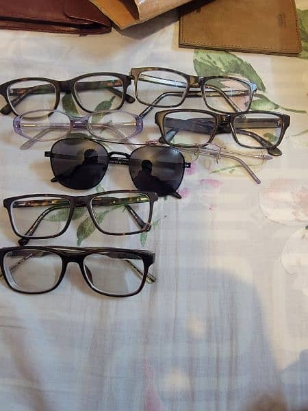 rayben,fossil,d&g eye glasses and sunglasses. 14