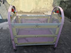 Baby cot used but good condition with free walker