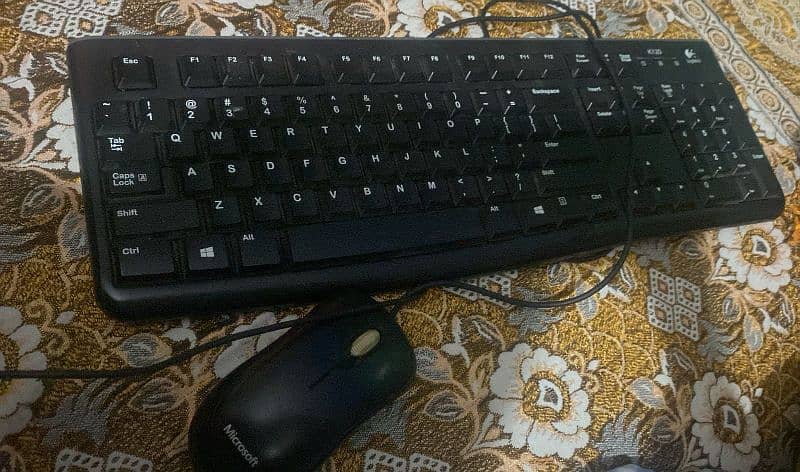 Logitech K120 Keyboard ,Microsoft Basic Optical Mouse 0