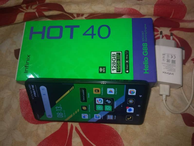 infnix hot 40.16/128gb fox or charger original 0