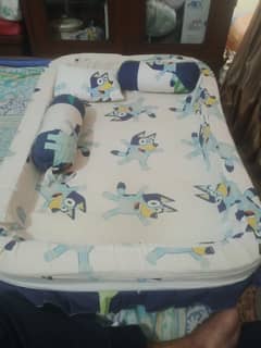 Baby bed with net and pillow