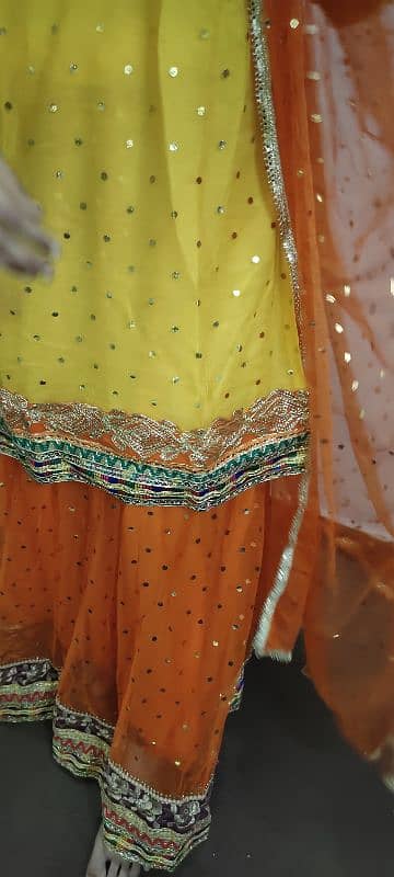 Orange net lehnga with kurta 2