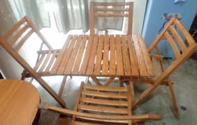 Wooden table with wooden chairs