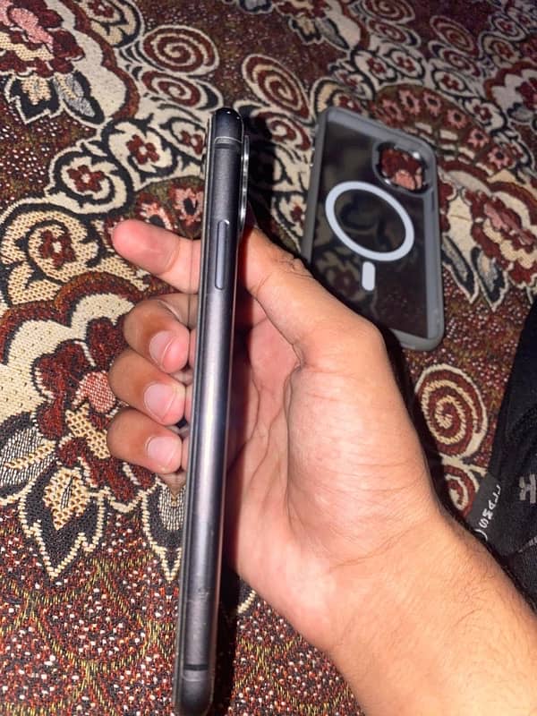 iPhone 11 with charger 6