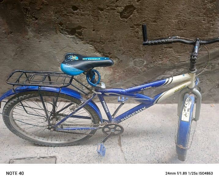 For sale bicycle in used condition 10 by 8 price 12000 rupees 2