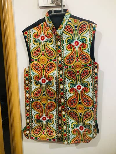 A cultural waistcoat to wear on Mehndi