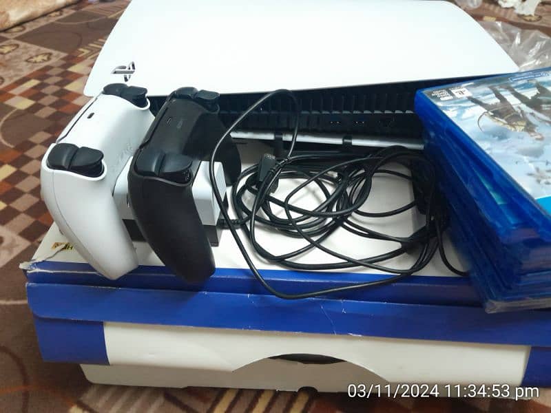 Play station 5 disk edition with speed wheel (thrust master) 1