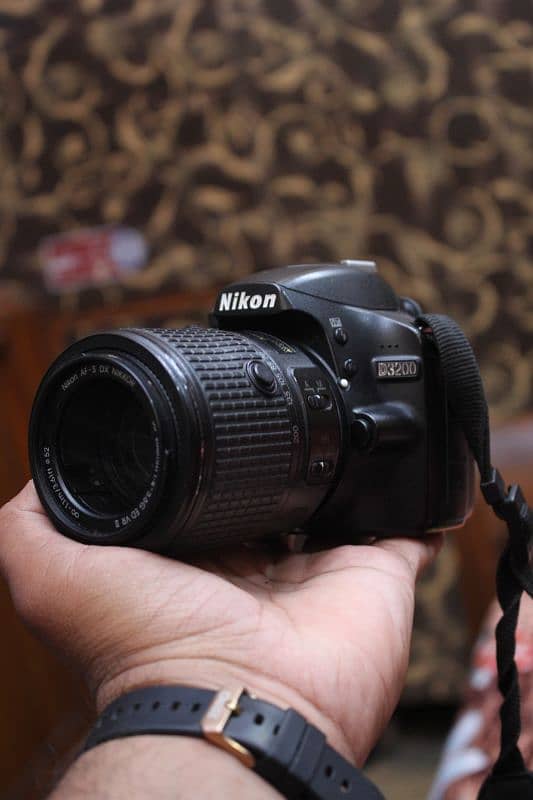 Nikon d3200 with 55/200mm Dx. 0