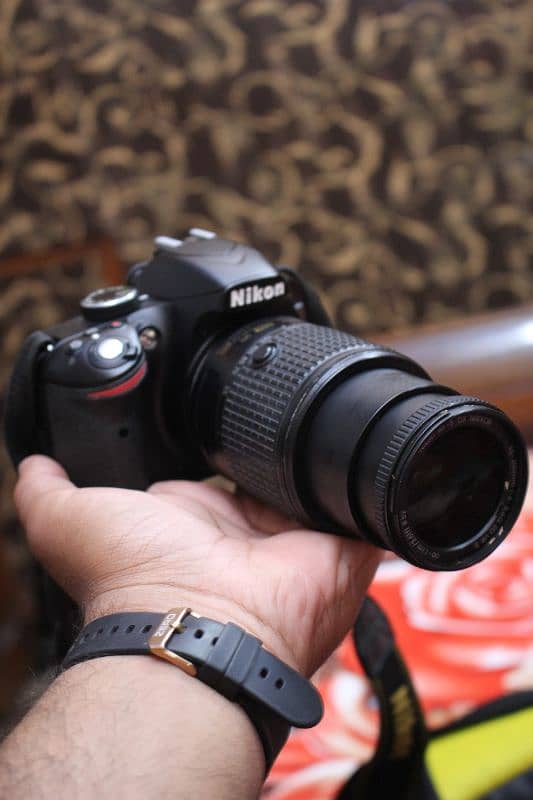 Nikon d3200 with 55/200mm Dx. 3