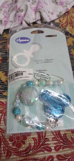 2 pack  pacifier and pacifier  attacher