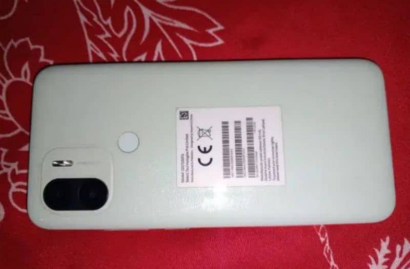 Redmi A one plus 0