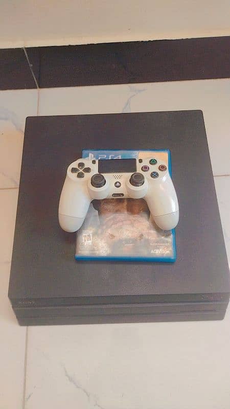 PS4 pro and steering wheel best condition 1