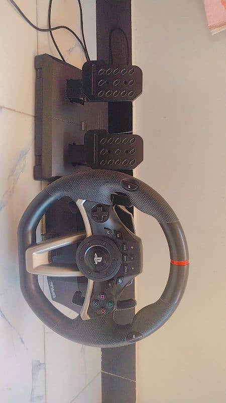 PS4 pro and steering wheel best condition 4