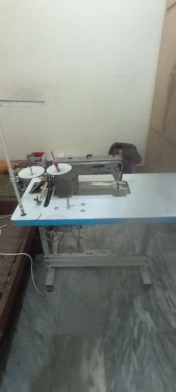 juki sewing machine good condition with frame and motor 0