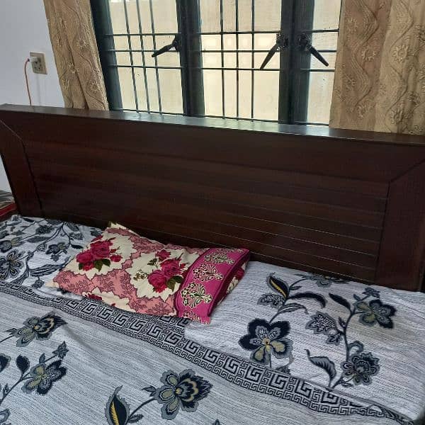 Brown wooden bed 3