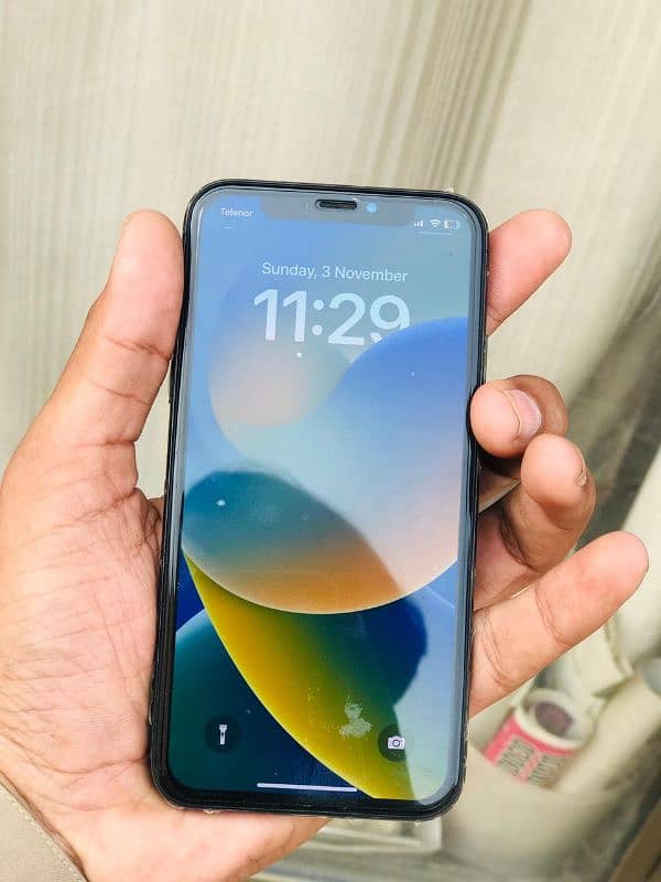 I phone x 64 GB official PTA appeared Good condition 1