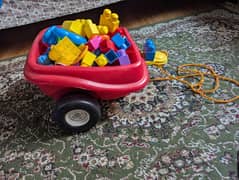 Mega blocks with red trolley little tikes