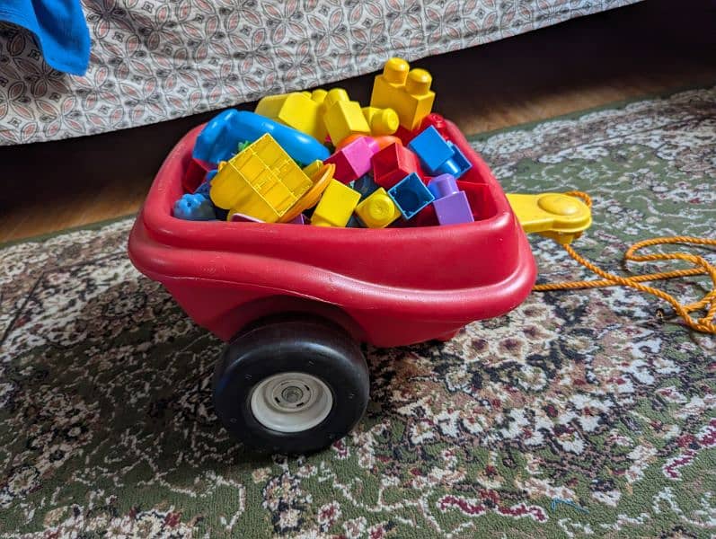 Mega blocks with red trolley little tikes 1