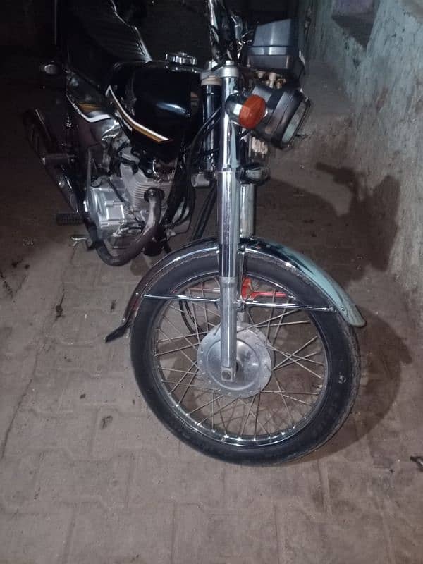 honda 125 with gold number urgent sale 0