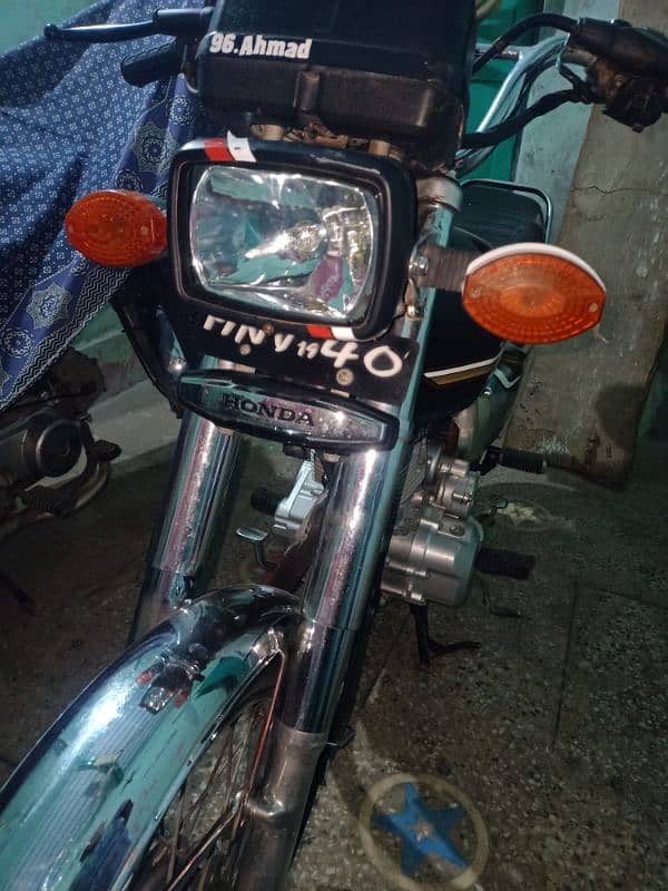 honda 125 with gold number urgent sale 15