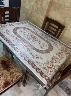 Dining table with 4 chairs in good condition