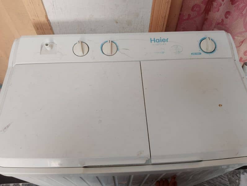 Haier washing machine with drier AND New Asia washing machinr 6