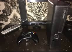 xbox 360 slim 200 gb and 19 games and camera