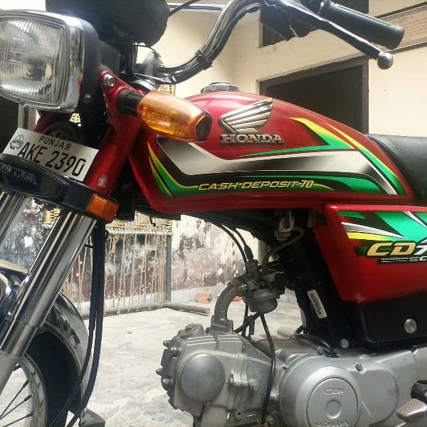 Honda CD 70 Red Color in a good neat and clean good condition 2