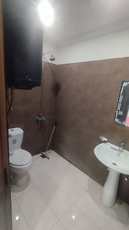 2 BEDROOM LIKE BRAND NEW FURNISH FLAT FOR RENT IN SECTOR C BAHRIA TOWN LAHORE 19