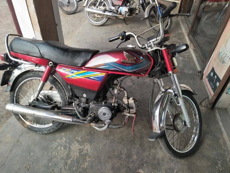 honda 70 red color biomatric available condition 10 bye 9 0