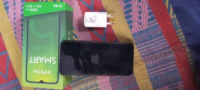 Infinix smart 5 3/64 gb with box or adopter