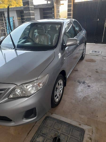 corolla gli 1.3 2013 4