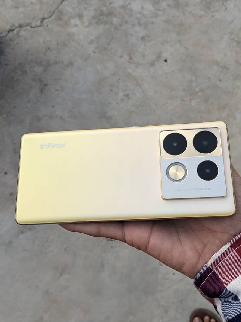 Infinix note 40 pro warranty 6 Months Golden colour  12+12/256 lush co 0